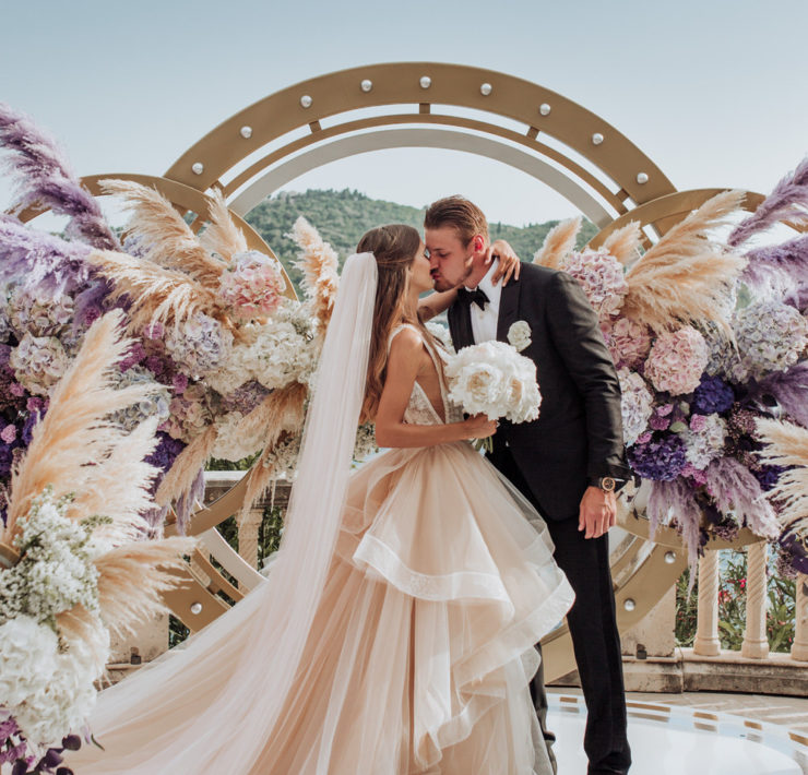bride and groom kiss during the ceremony in Croatia