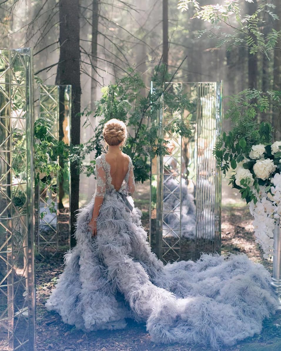 https://ruffledblog.com/wp-content/uploads/2020/01/couture-feather-wedding-dress-20200110_01.jpg