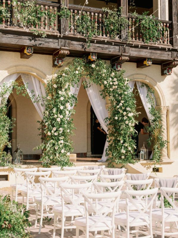 lush greenery arch at the ceremony