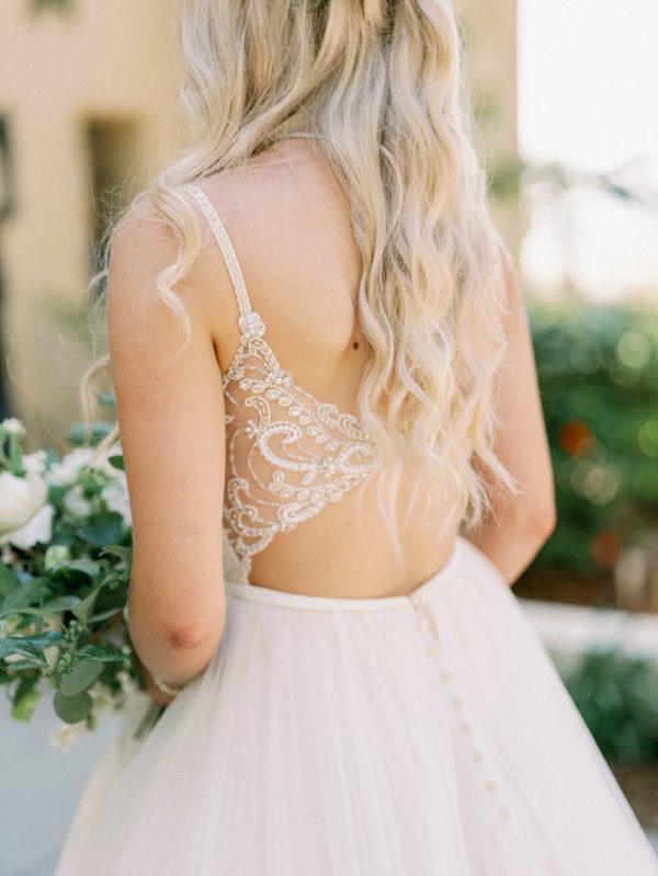 embellished bridal back to create a faux two piece look