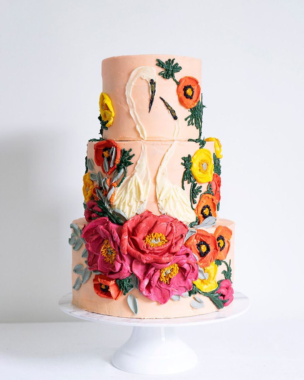 A wedding cake with buttercream roses – License Images – 11989298 ❘  StockFood