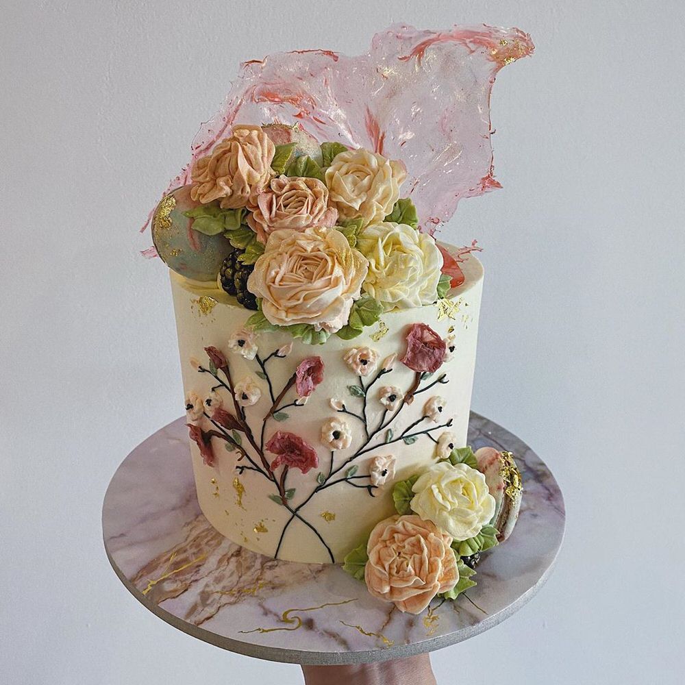 spring wedding cake with flower details and translucent accent