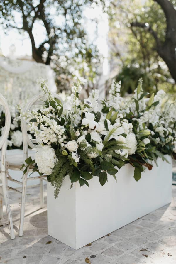 This White Carnation Flower Wall Was An Epic Surprise For The Groom ⋆ ...