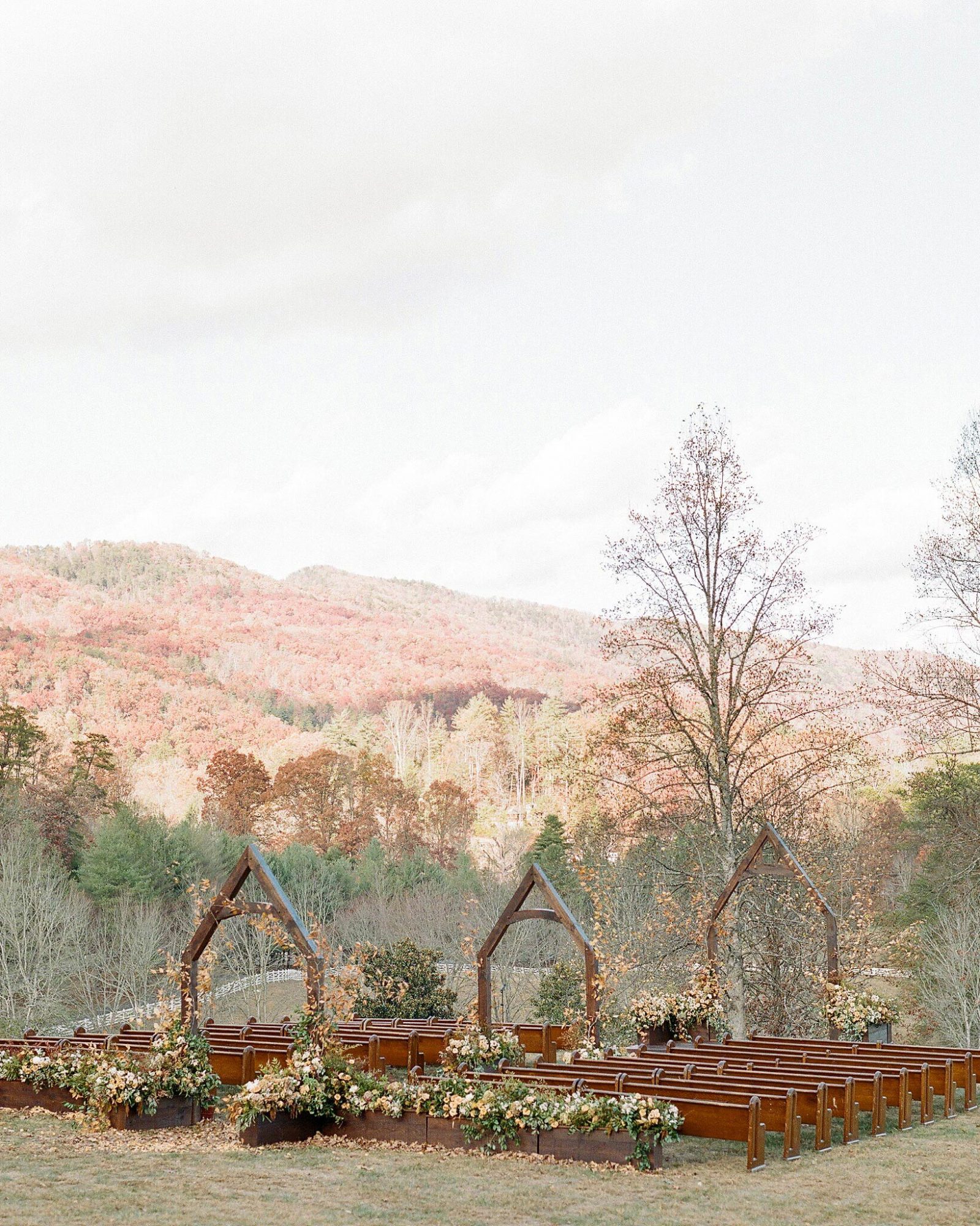 fall wedding backdrop with autumnal foliage