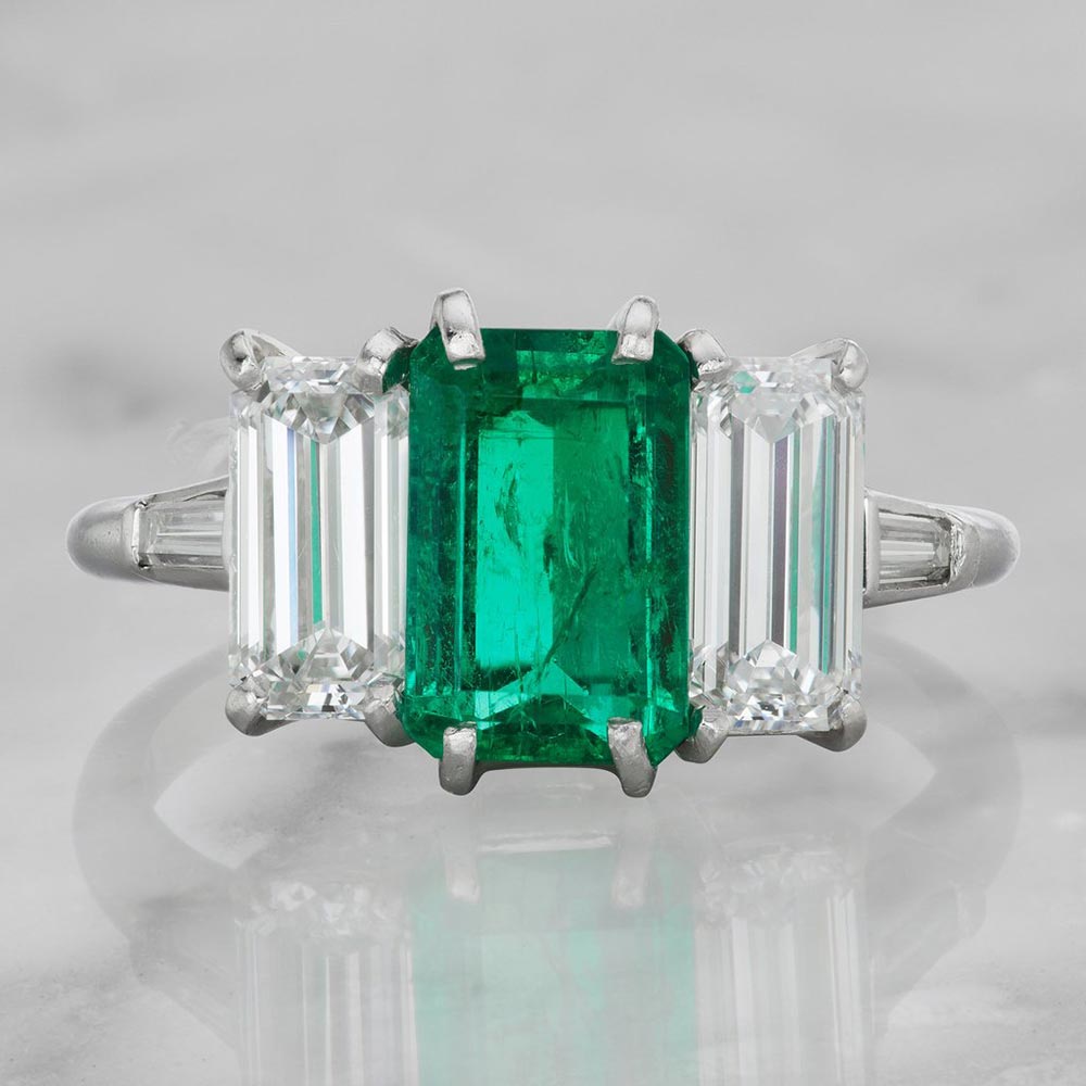 emerald cut emerald and diamond ring