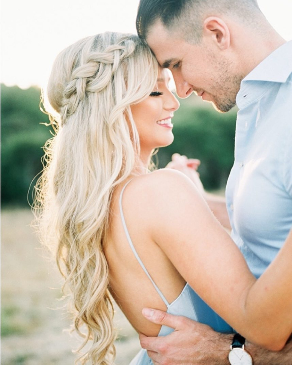 Half up down hairstyle for this engagement bride with that bunch of fresh  flowers finishing with soft… | Instagram