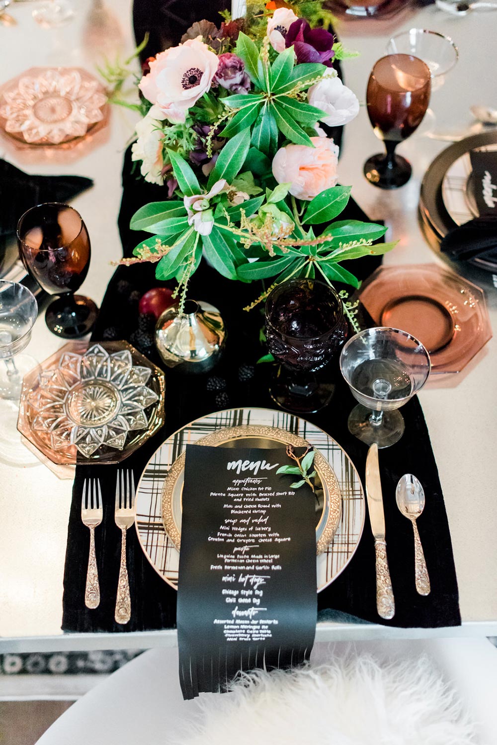 black leather wedding menus and grungy tablescape