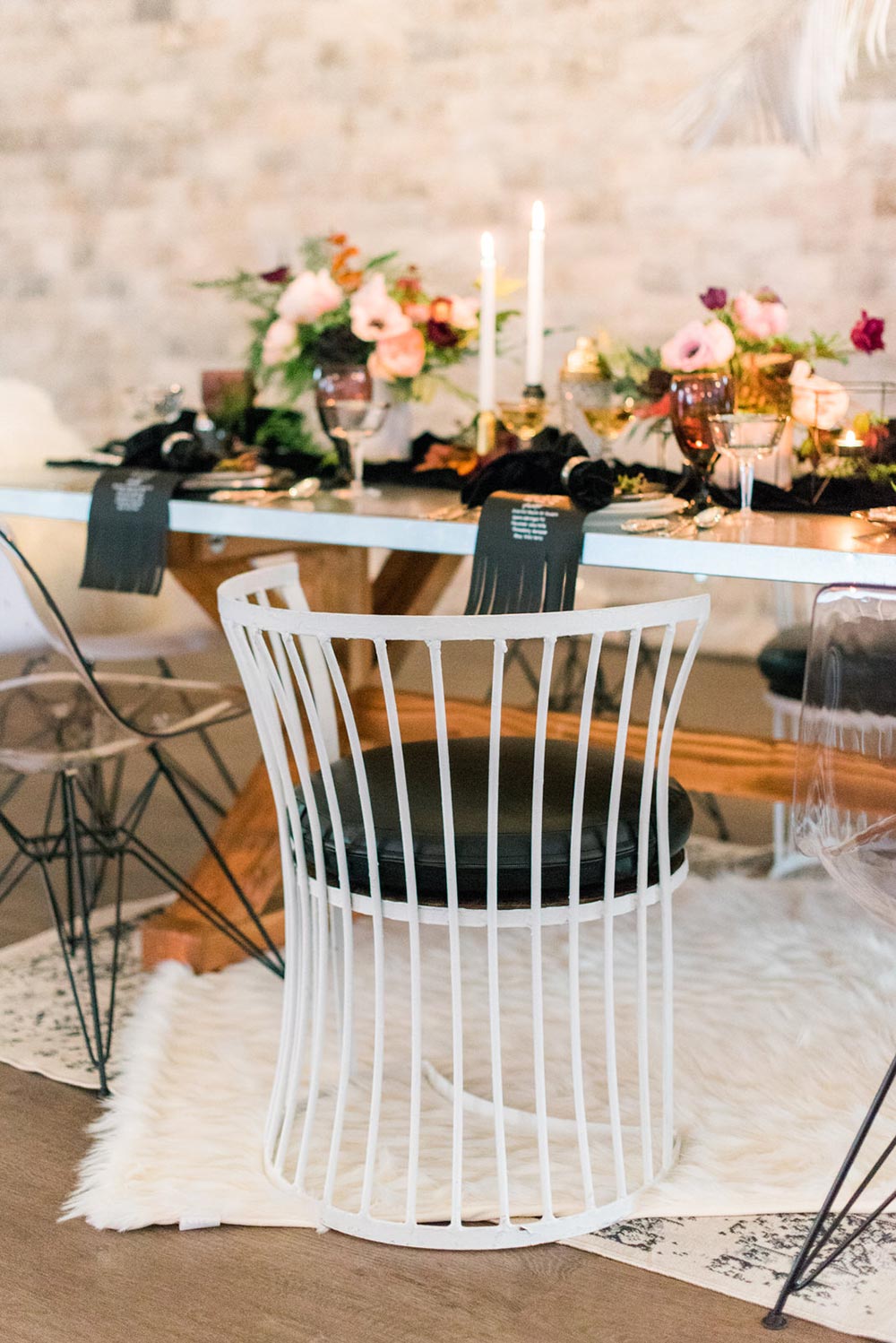 white metallic wedding chairs and grunge wedding tablescape