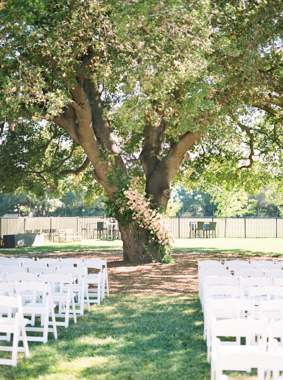 California Lovebirds Dance the Night Away Under a Lush Floral ...