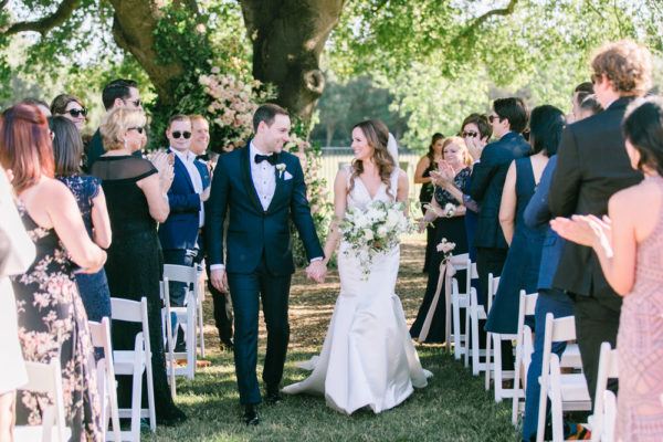 California Lovebirds Dance the Night Away Under a Lush Floral ...