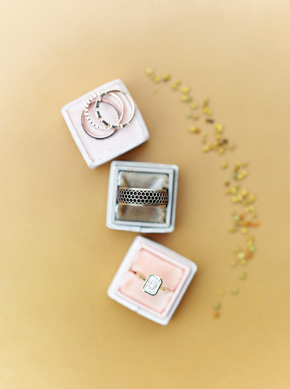 engagement ring and wedding rings