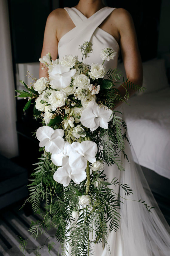 An Elegant Wedding with a Lush Cascading Bouquet in the Woods of Australia