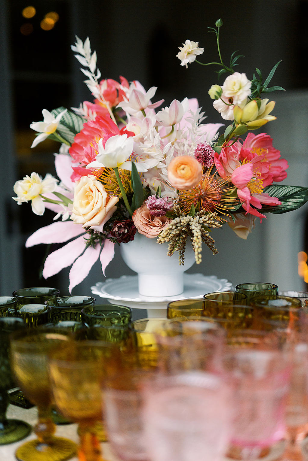 Colorful florals and glassware for bridal shower