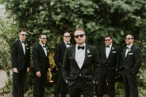 groomsmen style - photo by M2 Photography https://ruffledblog.com/black-tie-philadelphia-wedding-with-a-boho-twist