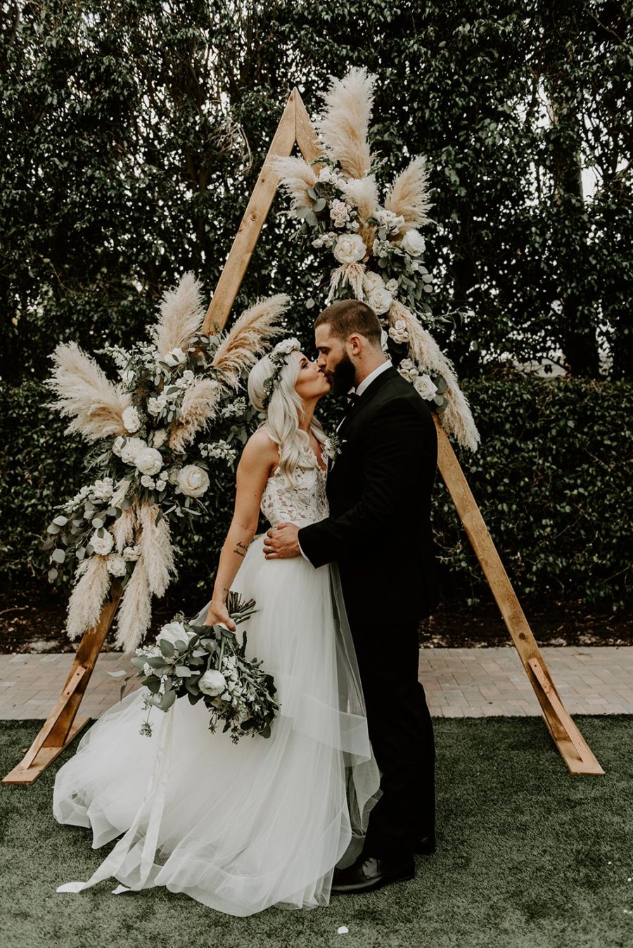 Tropical Boho Wedding With A Pampas Grass Arch And Muted Greens ⋆ Ruffled 