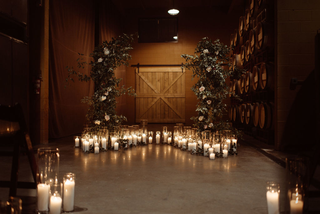candle-filled wedding ceremony venue
