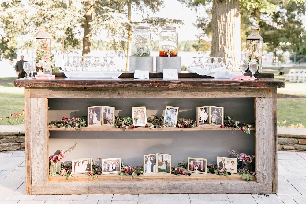 wedding welcome table with old pictures