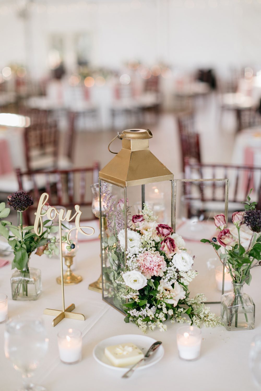 decorative lantern wedding centerpiece with laser cut table numbers