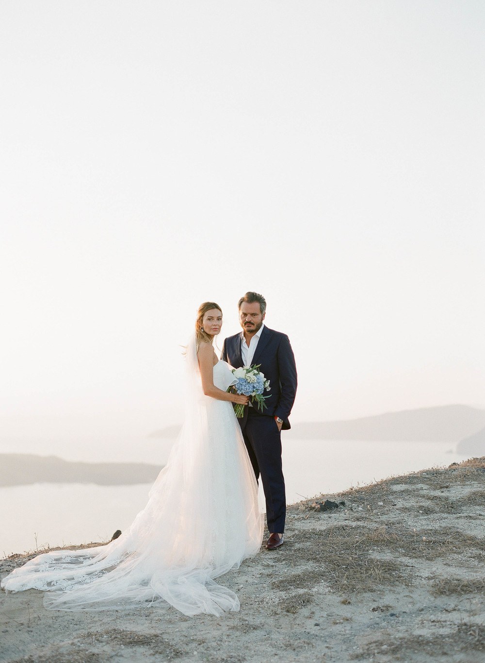 Cliffside Blue and White Wedding in Picturesque Santorini ⋆ Ruffled