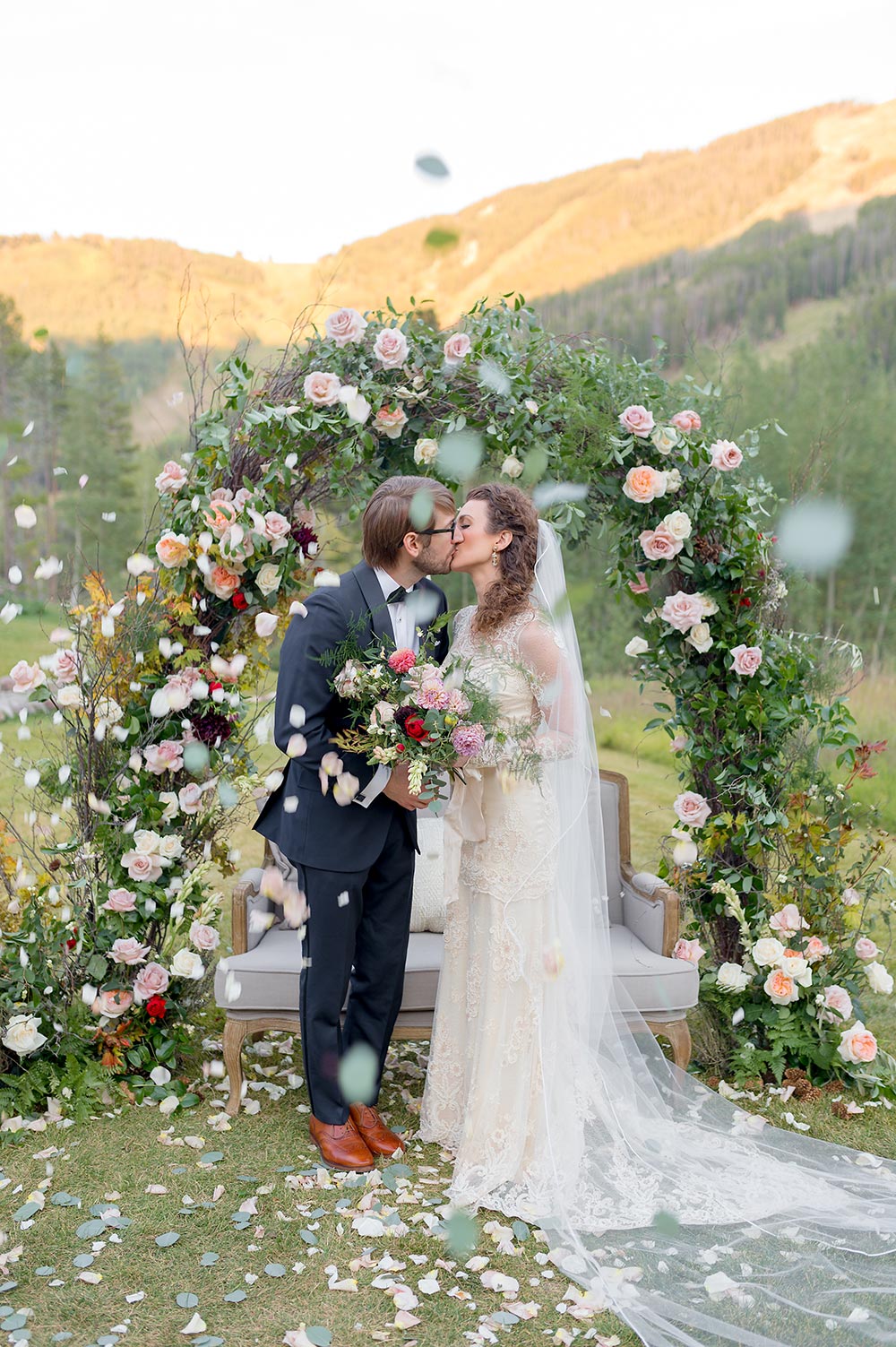 spring pastel floral arbor mountain wedding ceremony