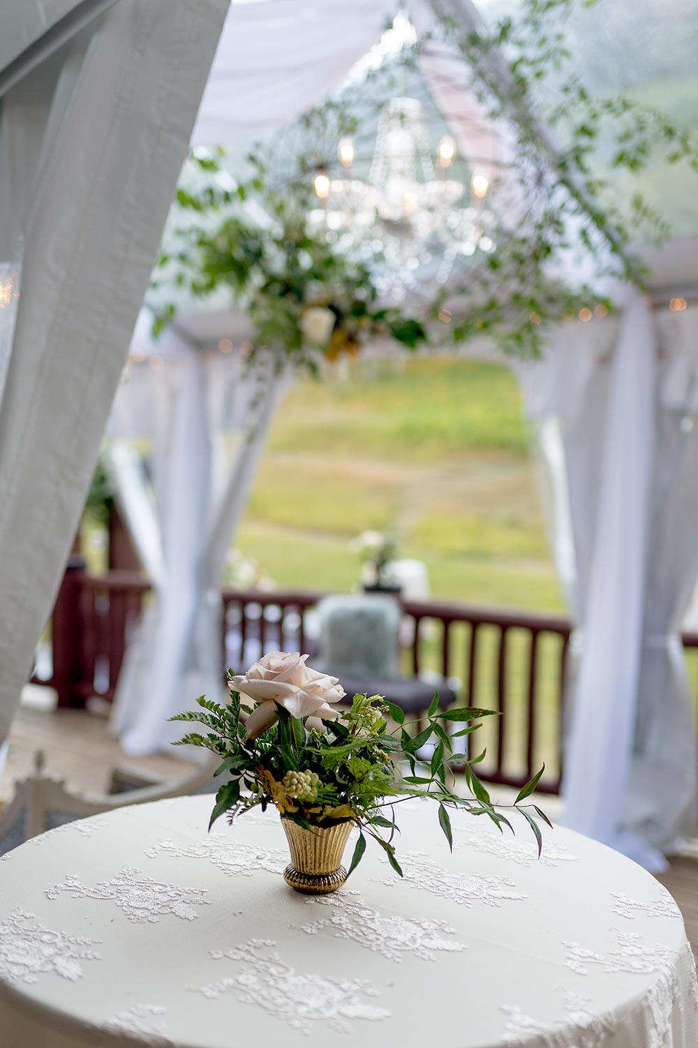 angel vine chandelier and simple wedding centerpiece cocktail hour