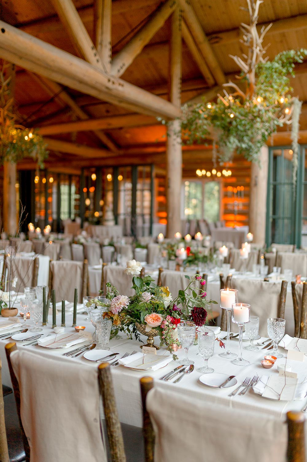 cabin wedding reception with candlelight and angel vines