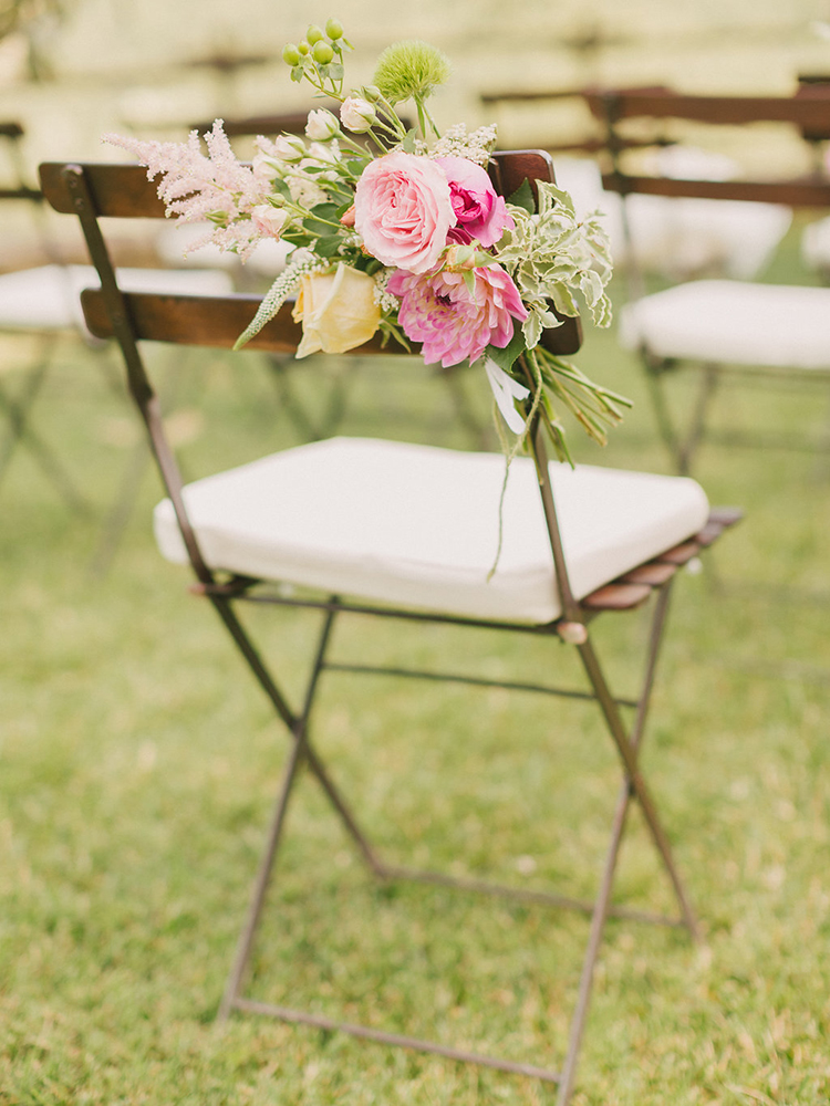 wedding chair decor - photo by Facibeni Fotografia https://ruffledblog.com/destination-wedding-in-tuscany-with-al-fresco-dining