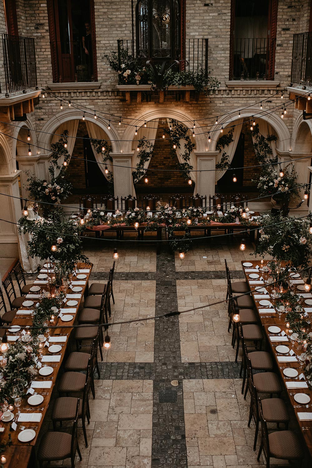 We thought this real wedding was an editorial because it's that perfect #indoorweddingvenue #longreceptiontables #chicwedding