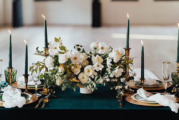 We’re Suckers For This Rich Velvet Tablescape #industrialwedding #geodes #emerald see more: https://ruffledblog.com/emerald-city-urban-loft