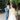modern and classical longsleeve wedding dress and blue groom suit first look