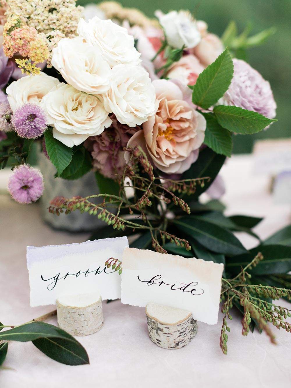 watercolor papyrus escort cards with calligraphy