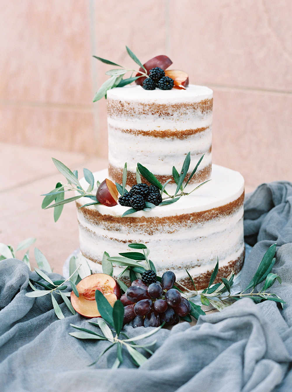 wedding cakes - photo by Melissa Jill https://ruffledblog.com/fruit-filled-vineyard-wedding-inspiration