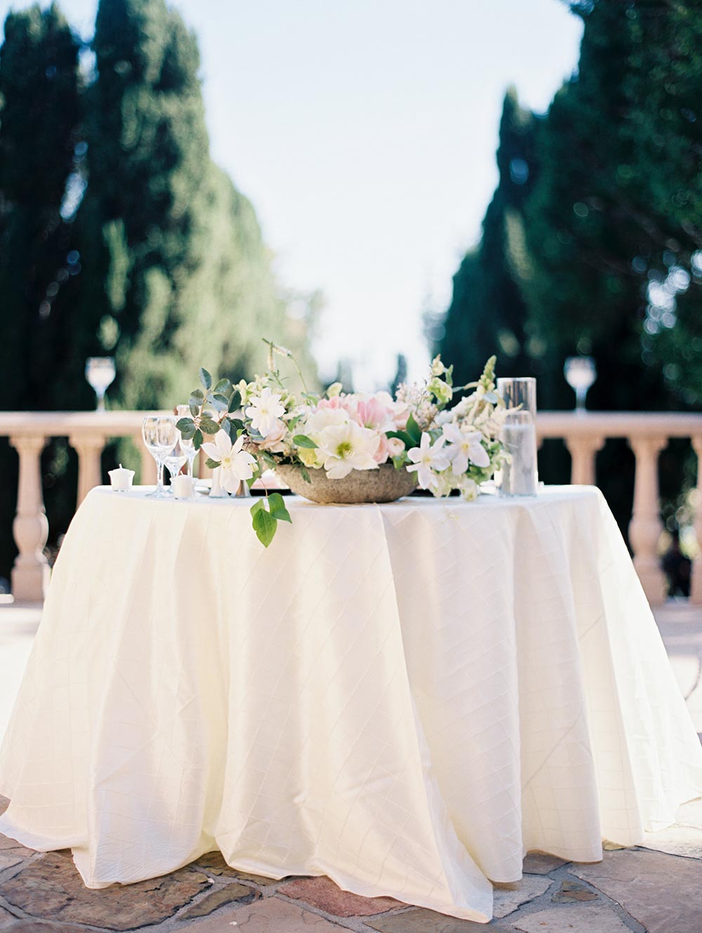 lily and spring flower wedding centerpiece sweetheart table