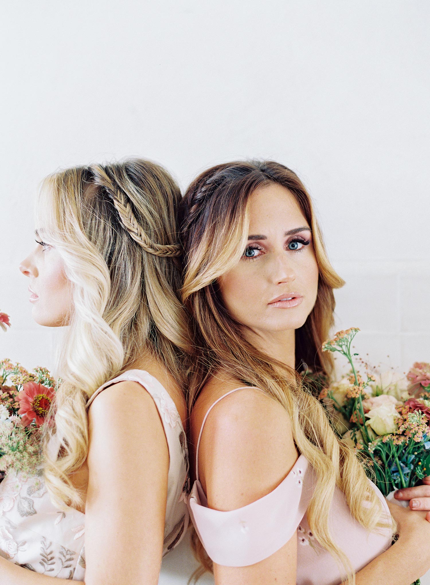 floral bridesmaid dresses and half up half down hairstyles