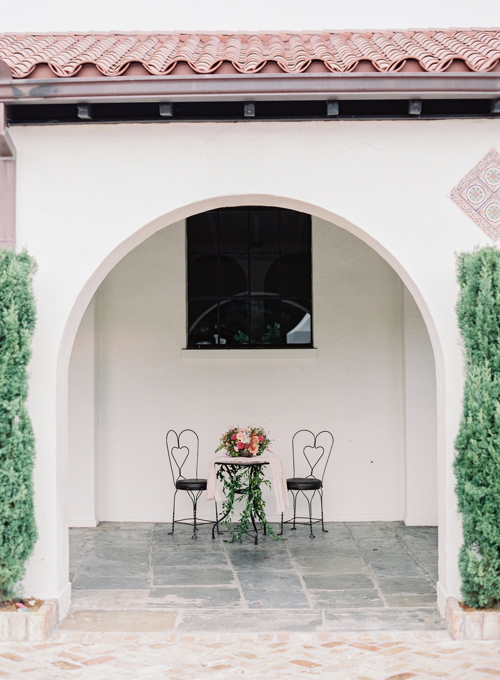 sweetheart bistro table with iron garden chairs