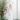 sheer v-neck lace wedding dress with fluted skirt and pampas grass backdrop
