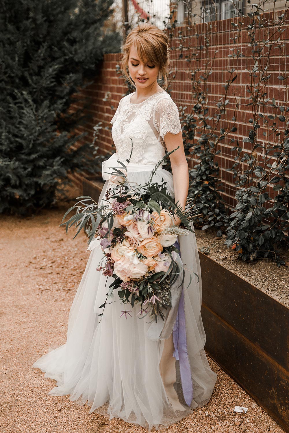 Wedding dress with macramé elements 