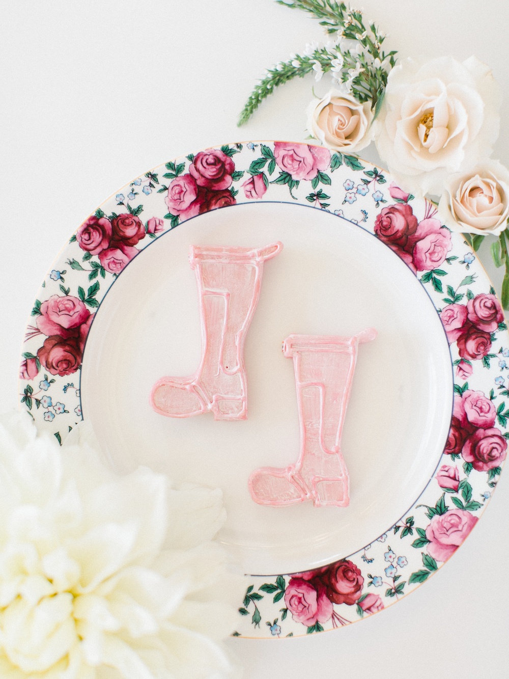 handpainted cookies with pink rain boot shape