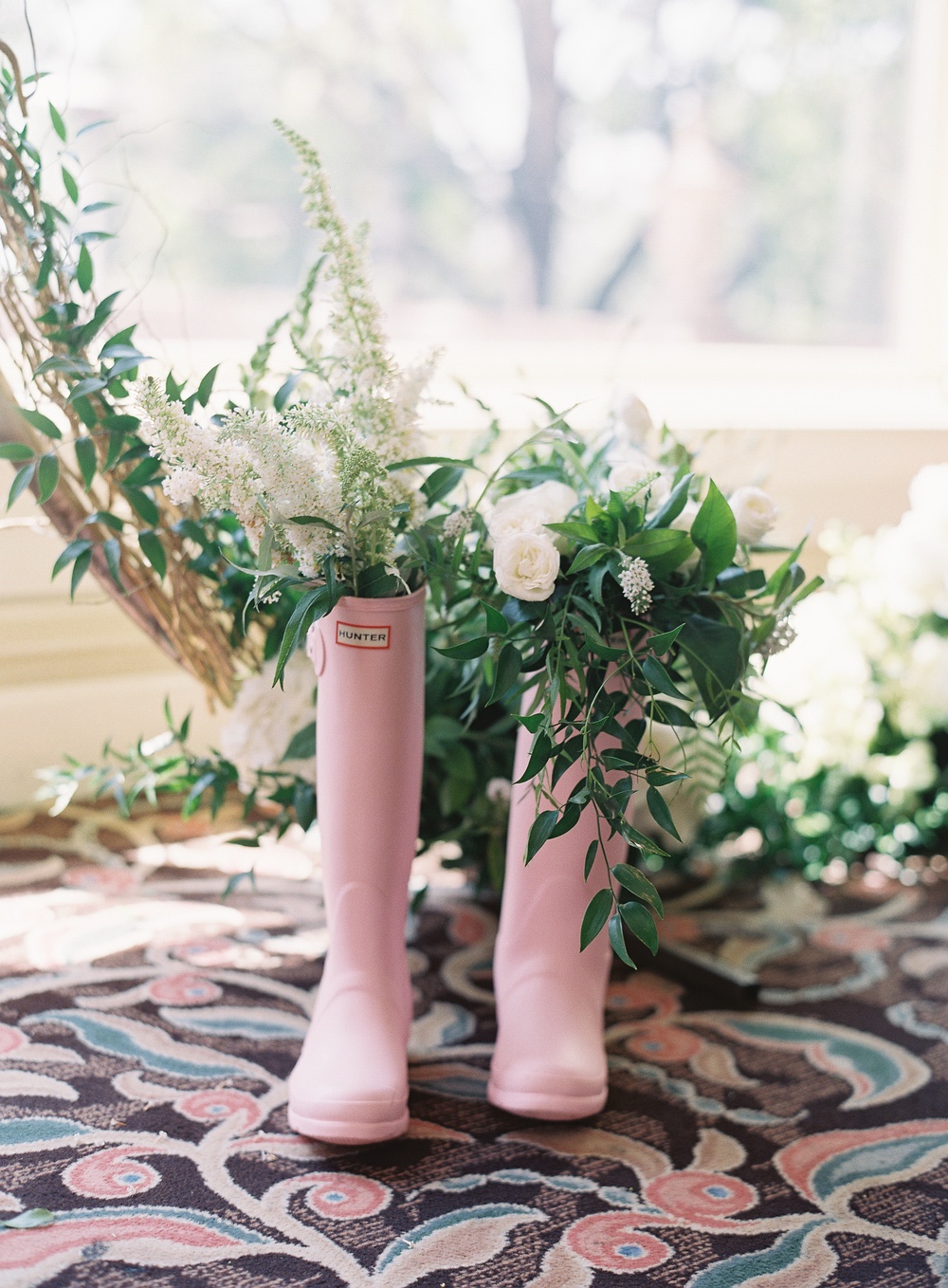 pink Hunter rain boots with lots of flowers
