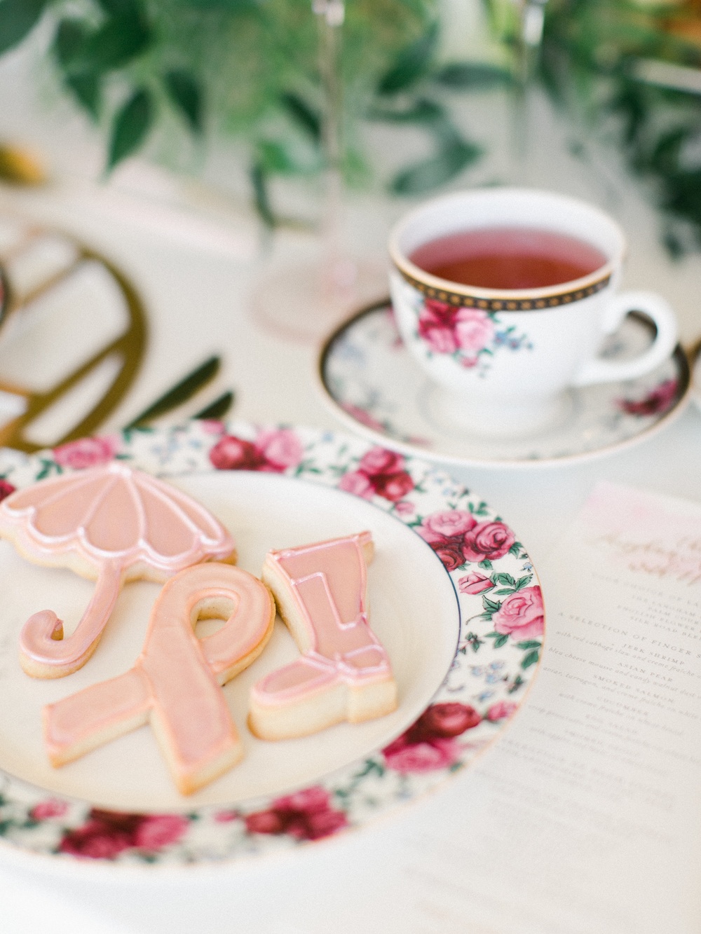 handpainted cookies with pink rain boot shape