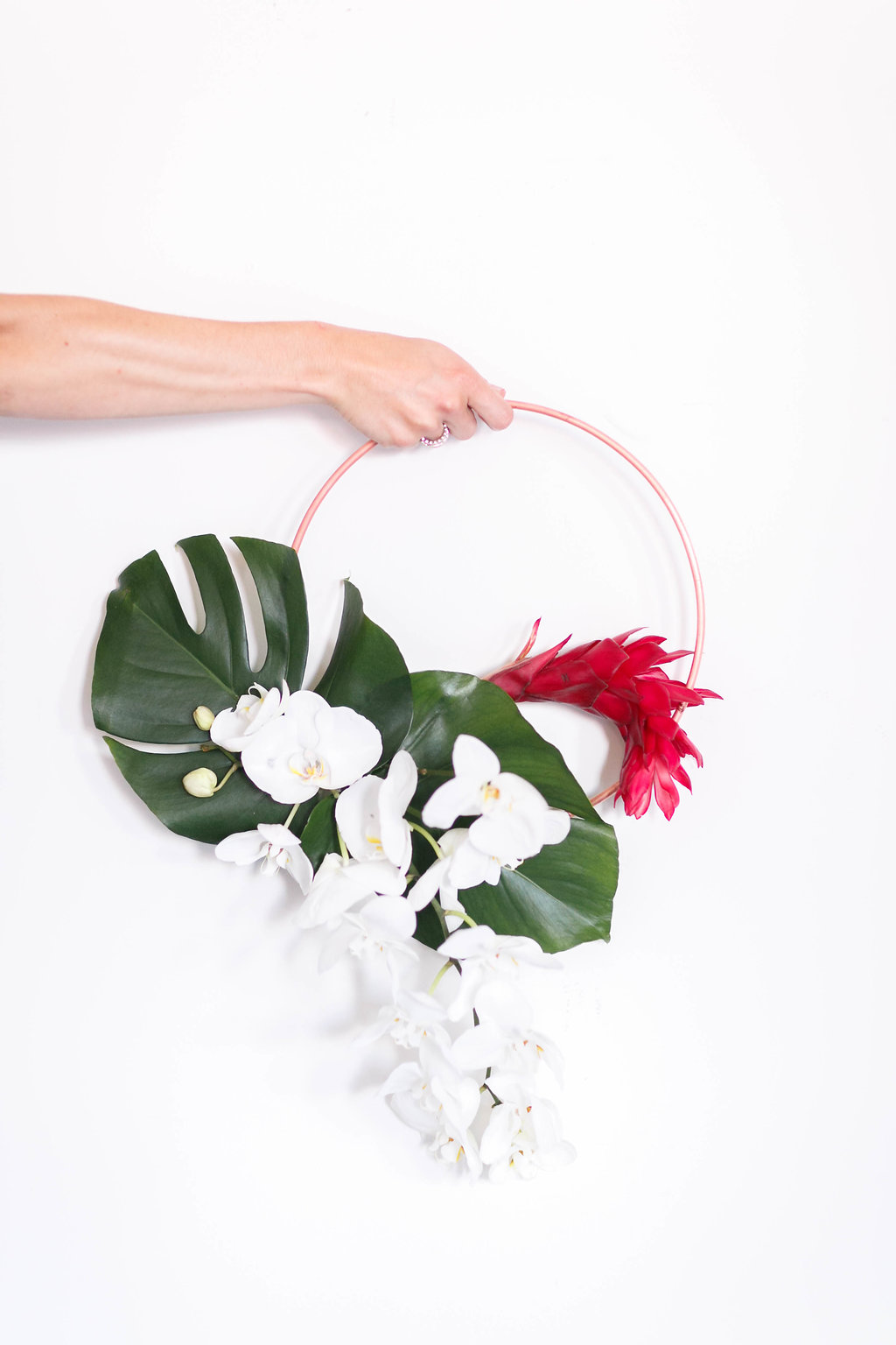 tropical wreath bouquets - photo by Virginia Ashley Photography https://ruffledblog.com/modern-industrial-wedding-inspiration-with-tropical-vibes