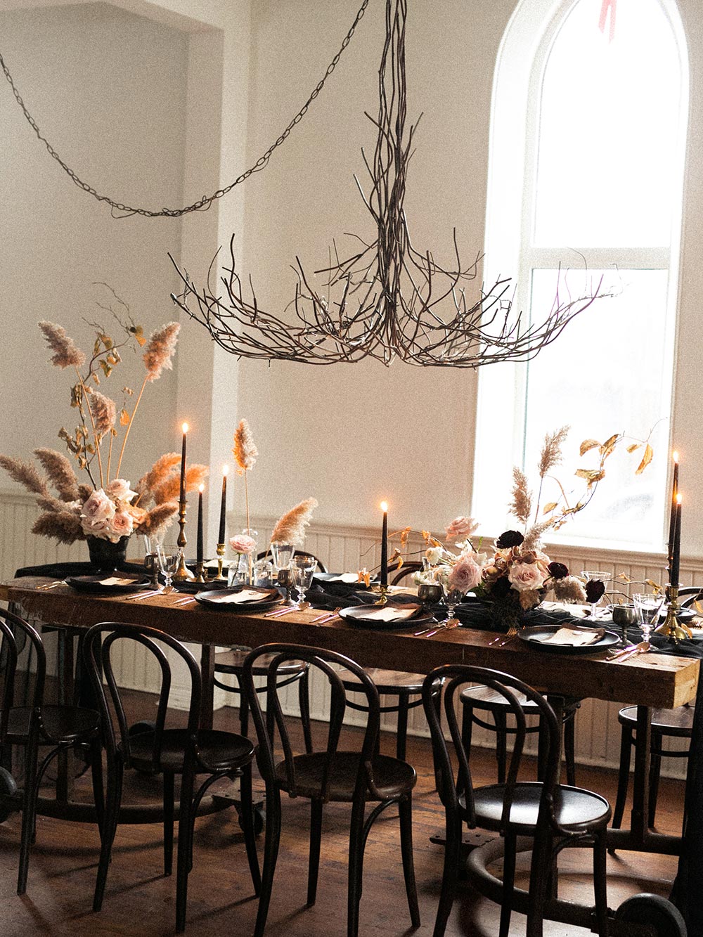 pampas grass tablescape with thin branch chandelier