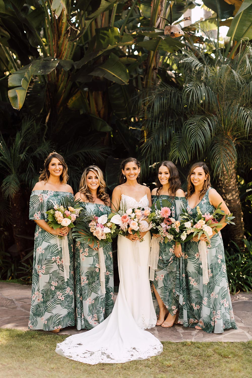 tropical printed bridesmaid dresses and embroidered wedding dress