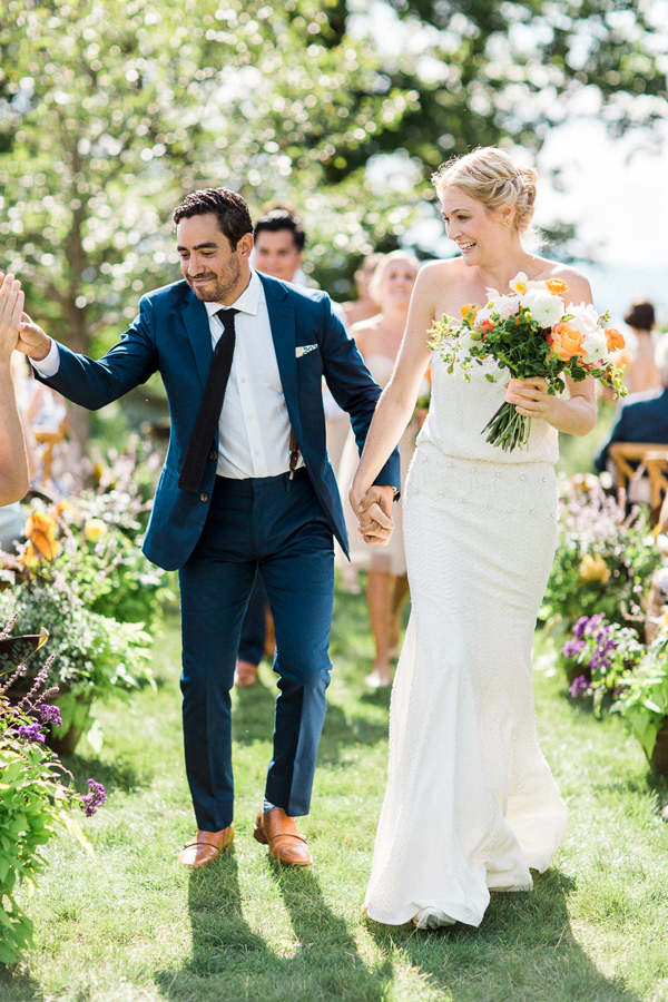 ceremony recessional - photo by Christina Bernales Photography https://ruffledblog.com/vermont-garden-wedding