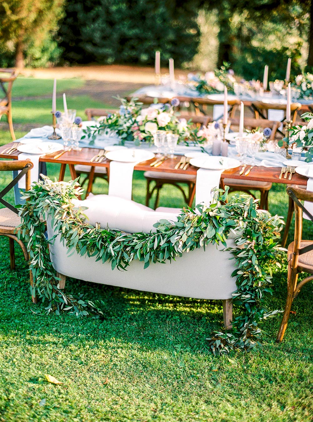 sweetheart table with greenery garland